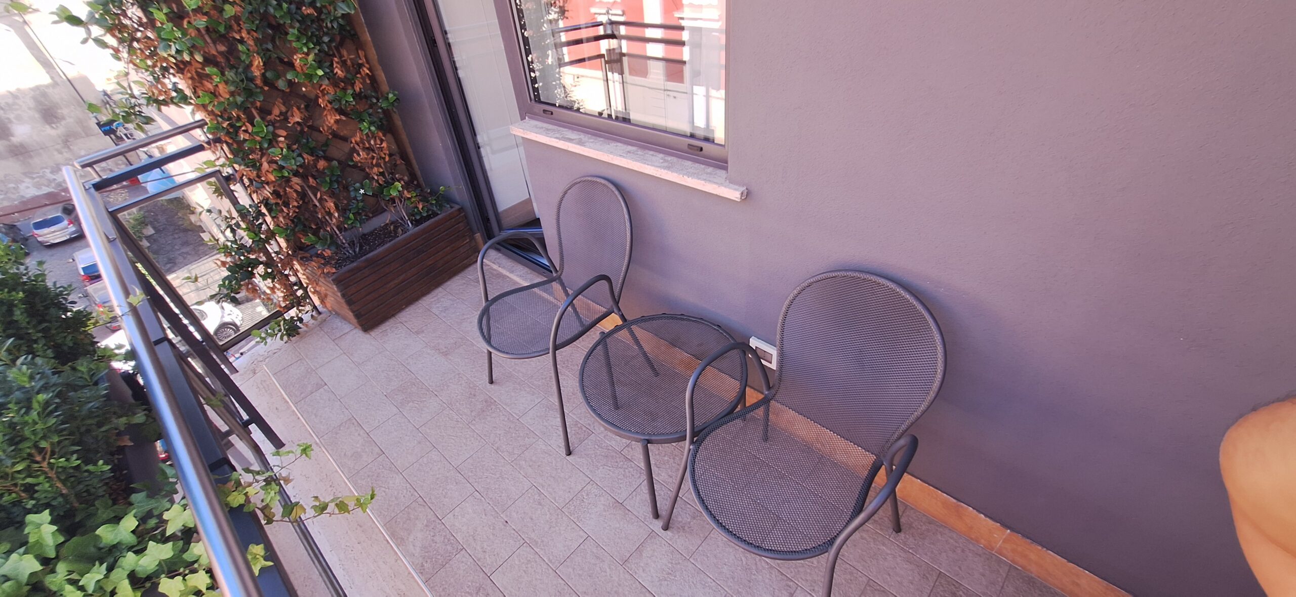 a group of chairs on a patio
