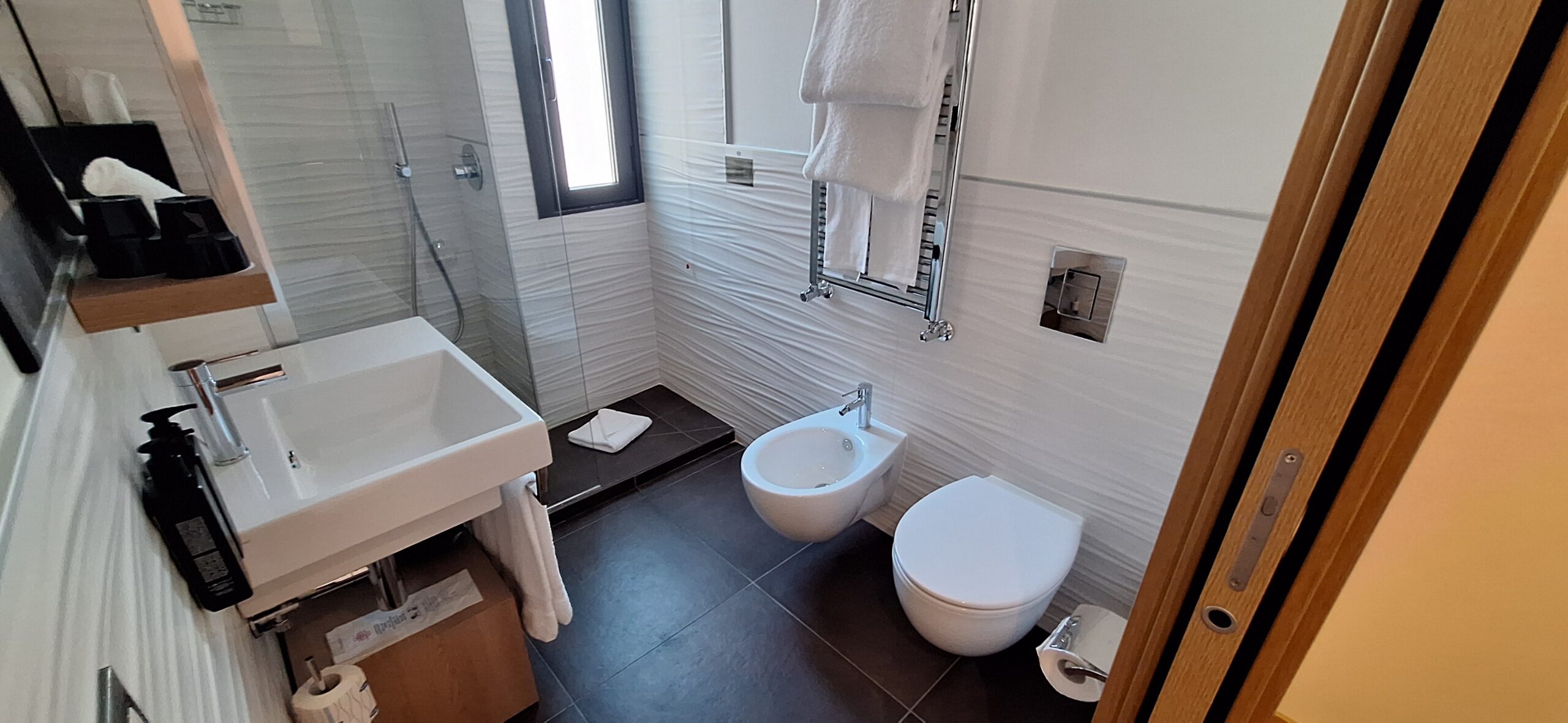 a bathroom with a sink and toilet