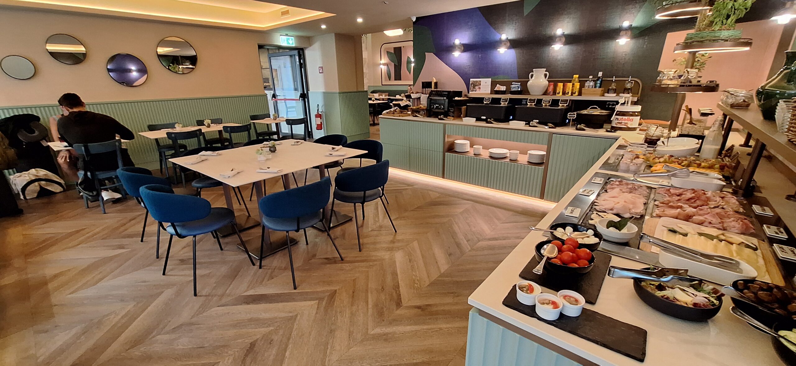 a restaurant with tables and chairs