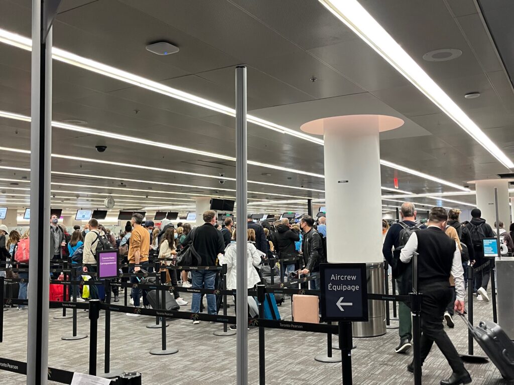 a group of people in an airport