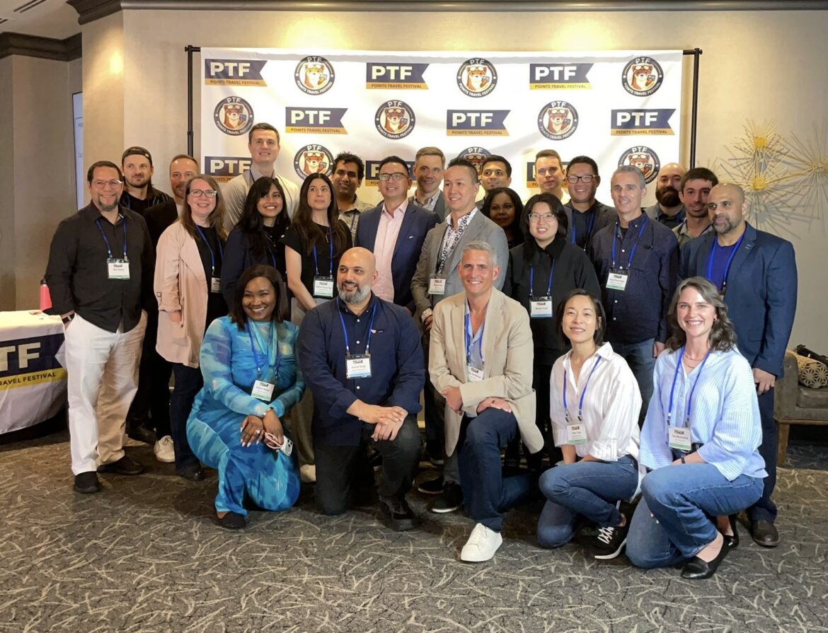 a group of people posing for a photo