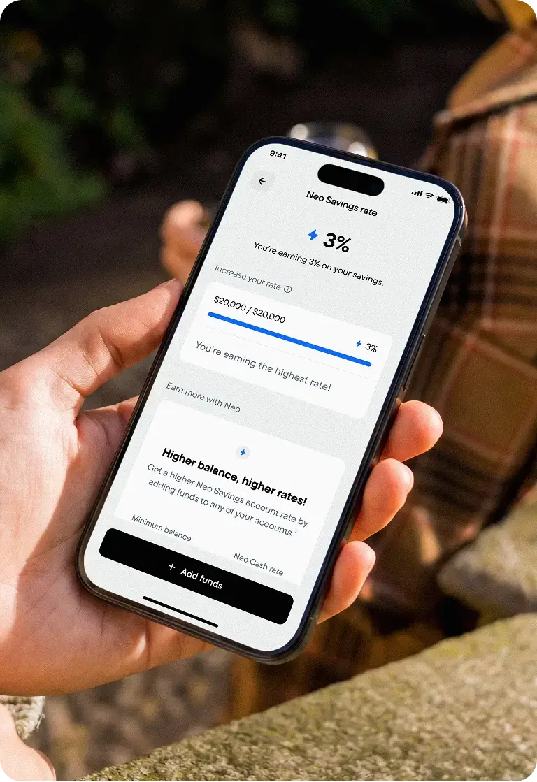 a hand holding a cell phone