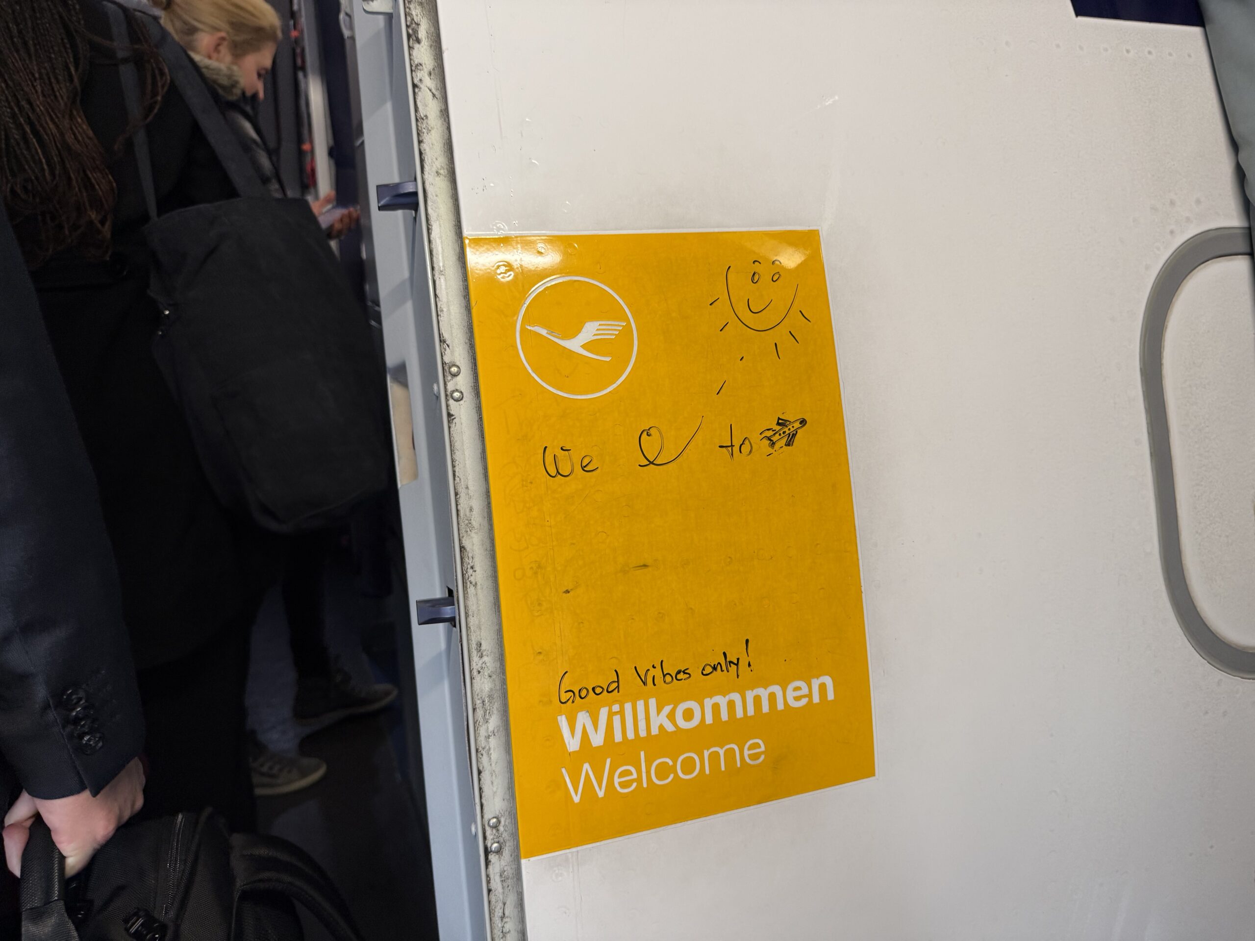 a yellow sign on a door