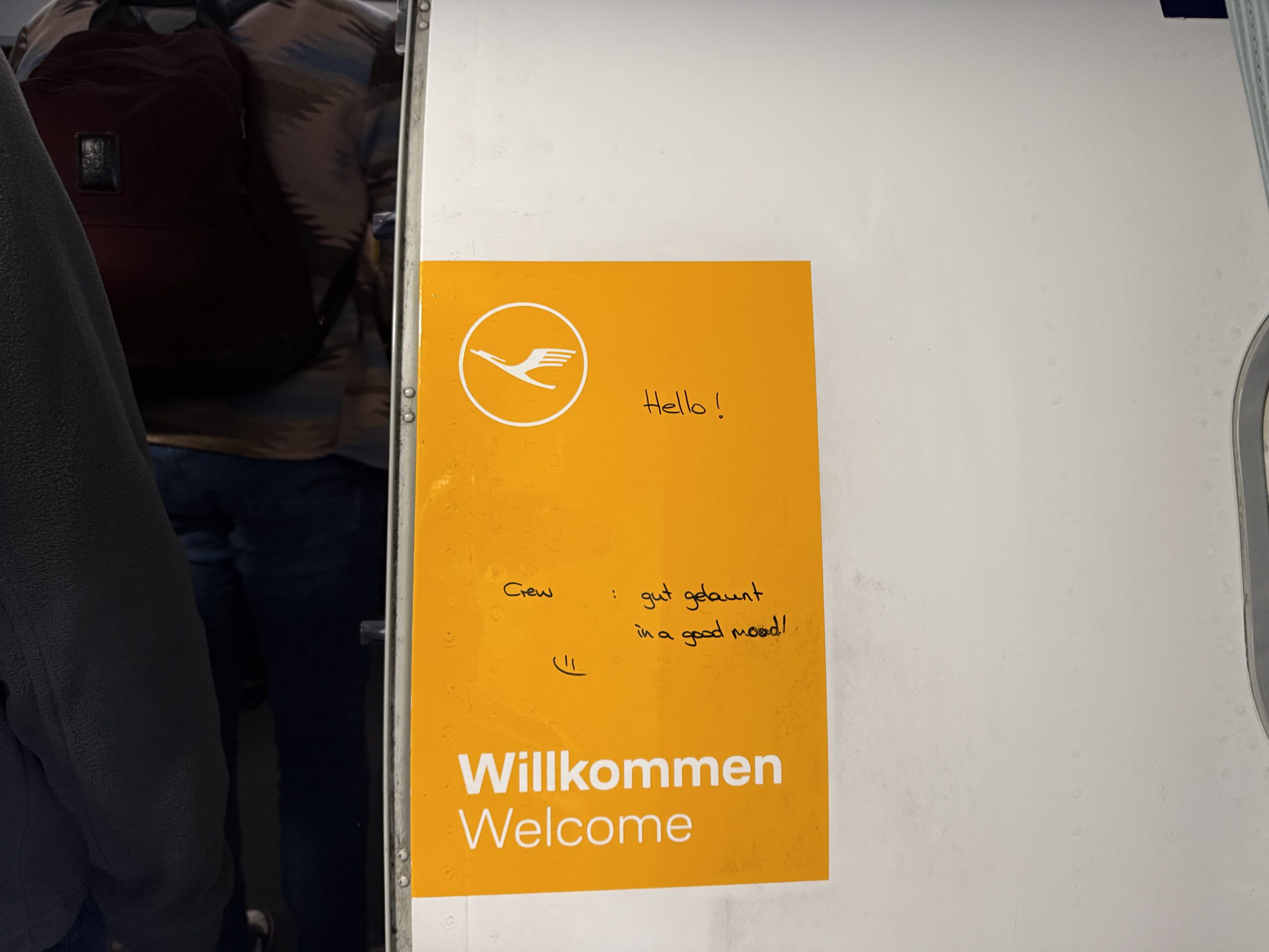 a yellow sign on a wall