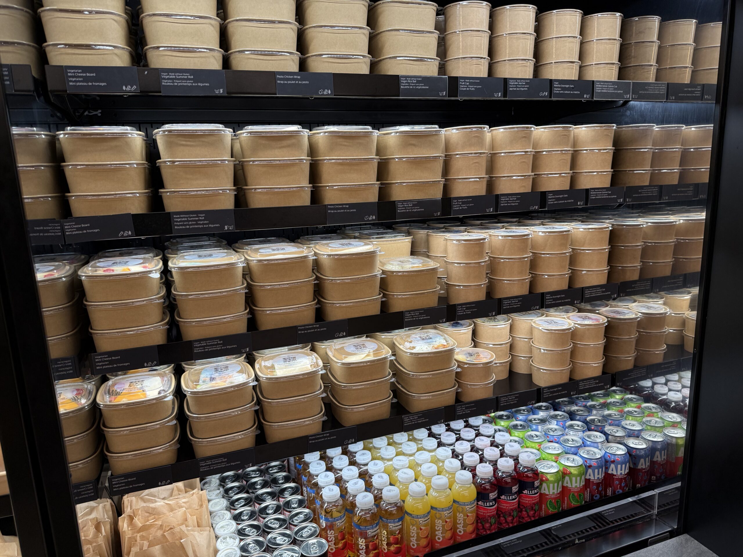 Air Canada Cafe YVR C47 a shelf with containers of food