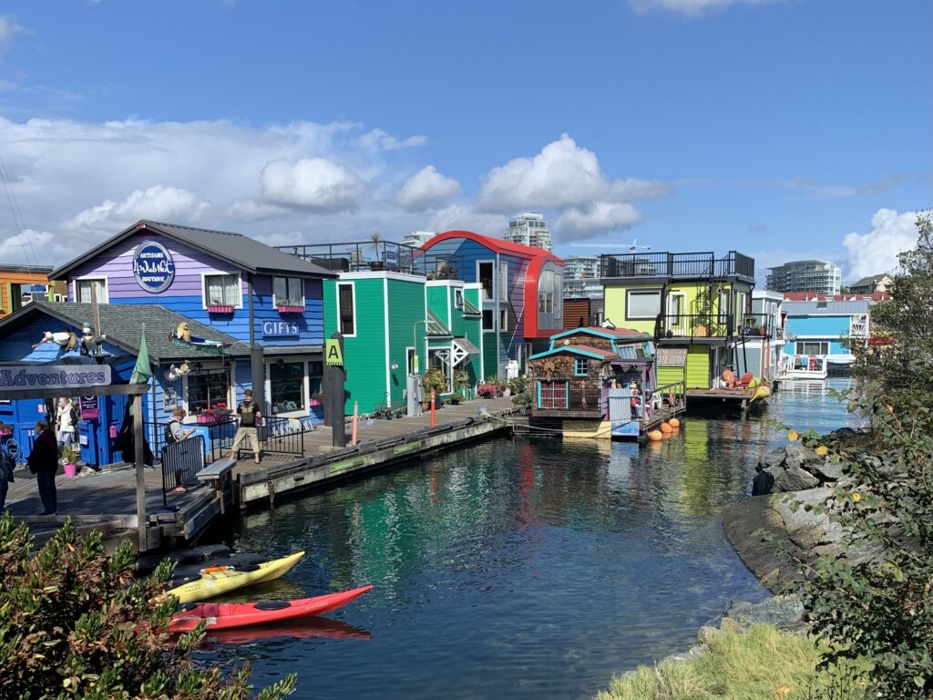 a water way with colorful buildings and boats