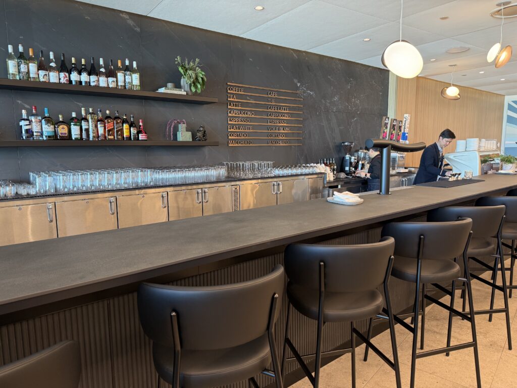 Air Canada Cafe YVR C50 a bar with a counter and chairs