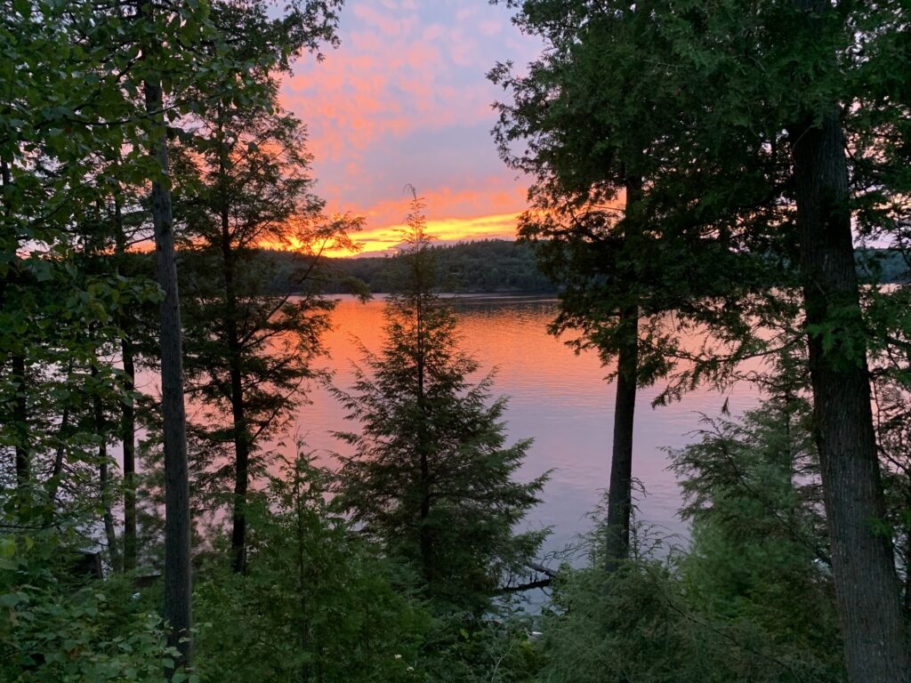 a sunset over a lake