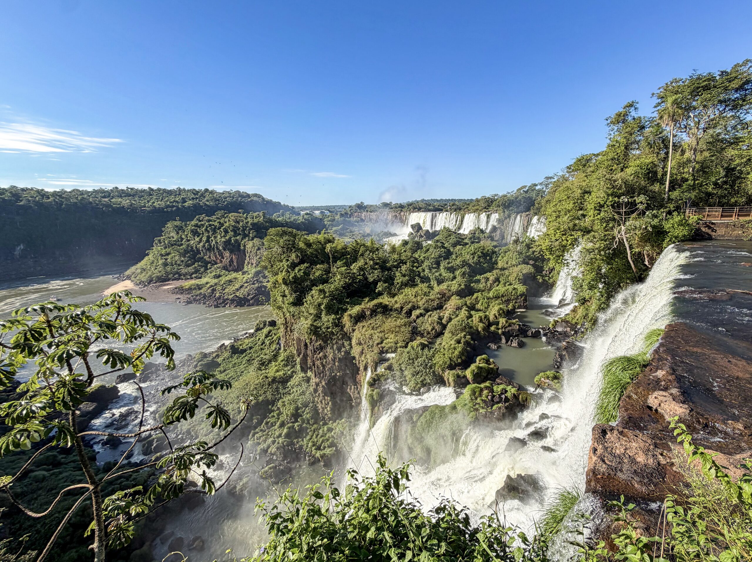 a waterfall surrounded by trees