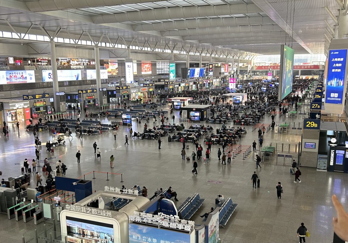 a large airport with many people
