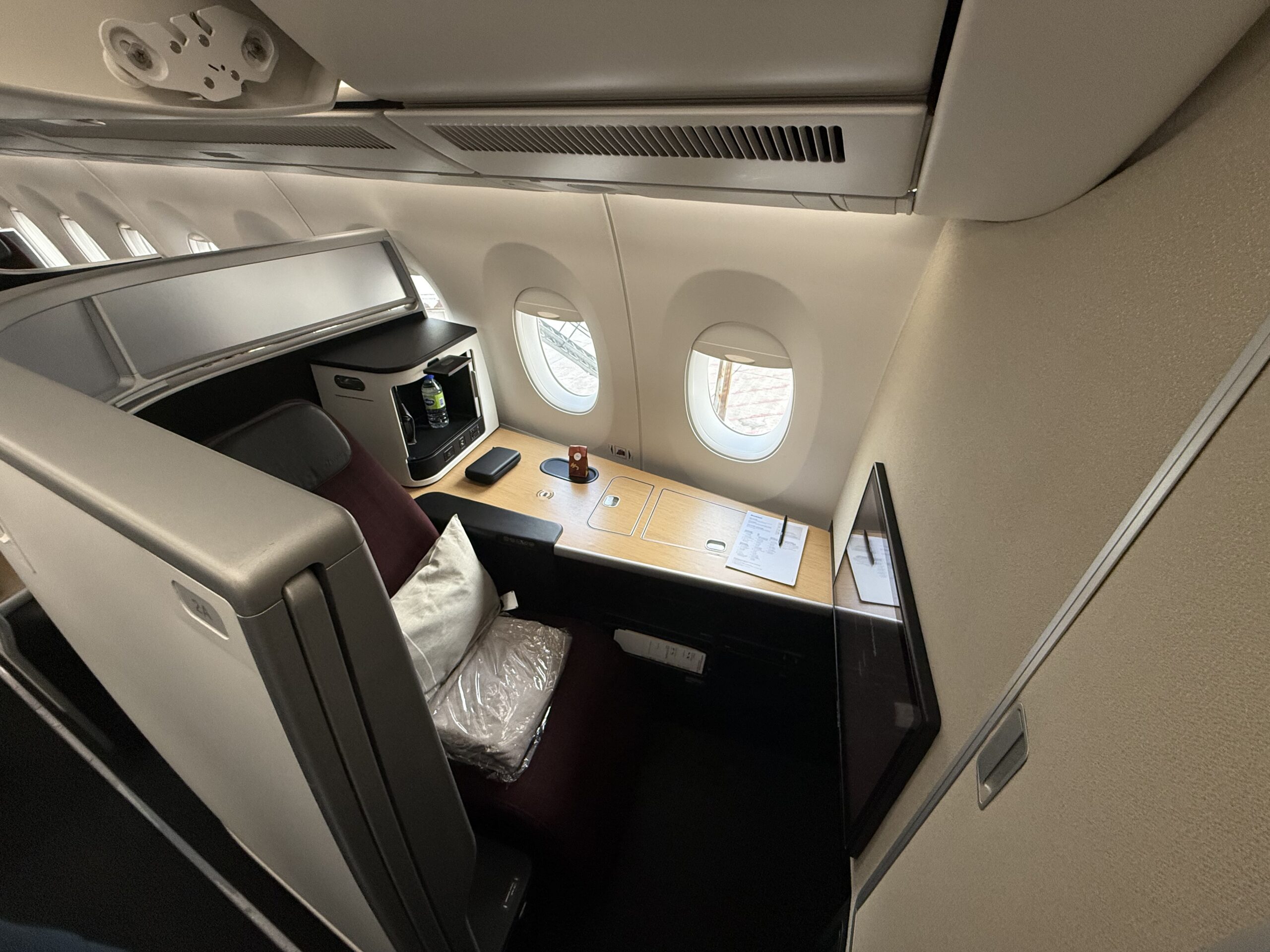 a table with a tv and a table in a plane