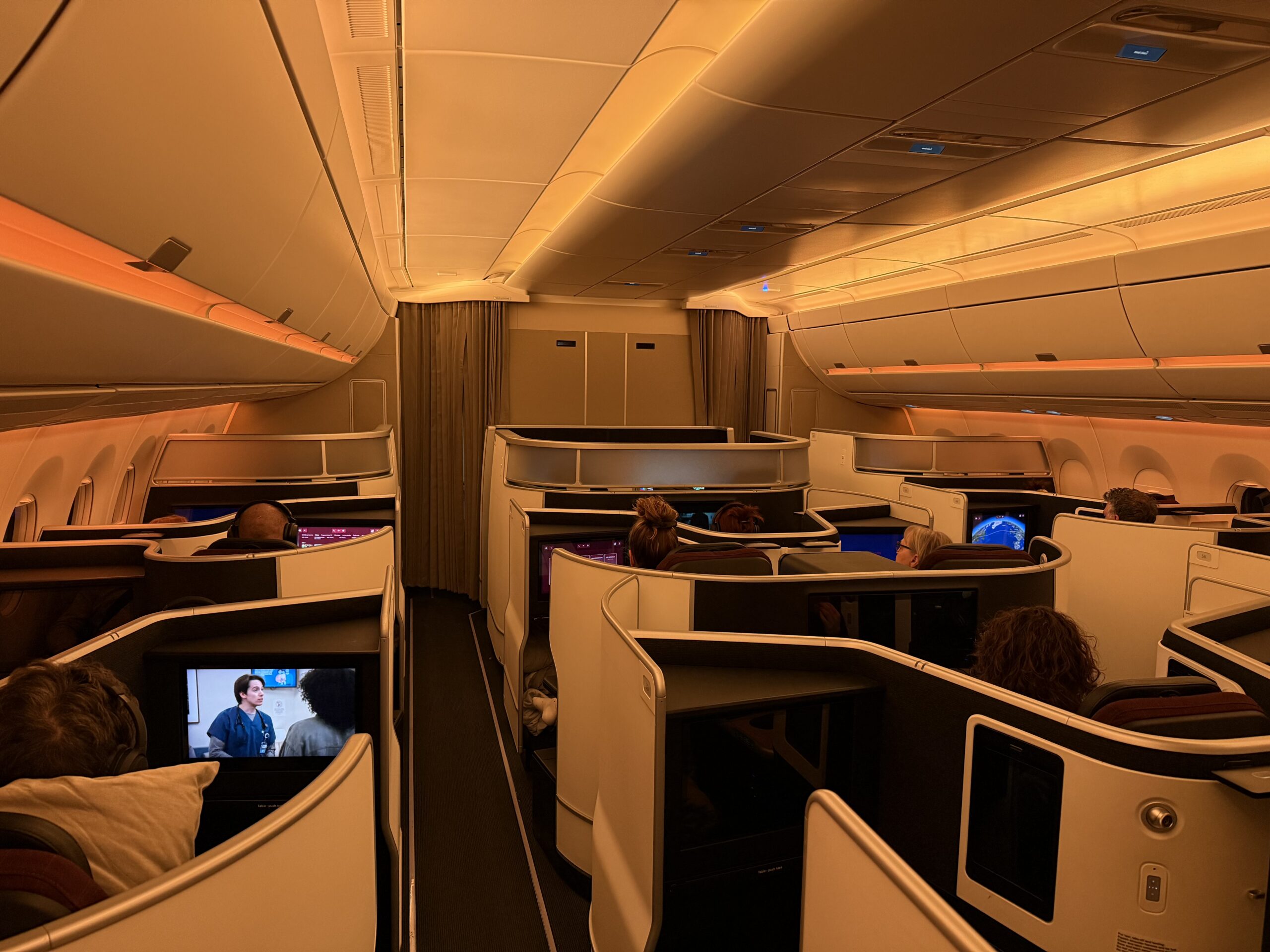 a group of people sitting in an airplane