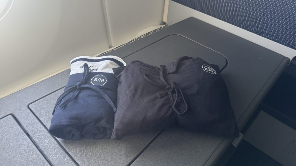a pair of folded shirts on a table