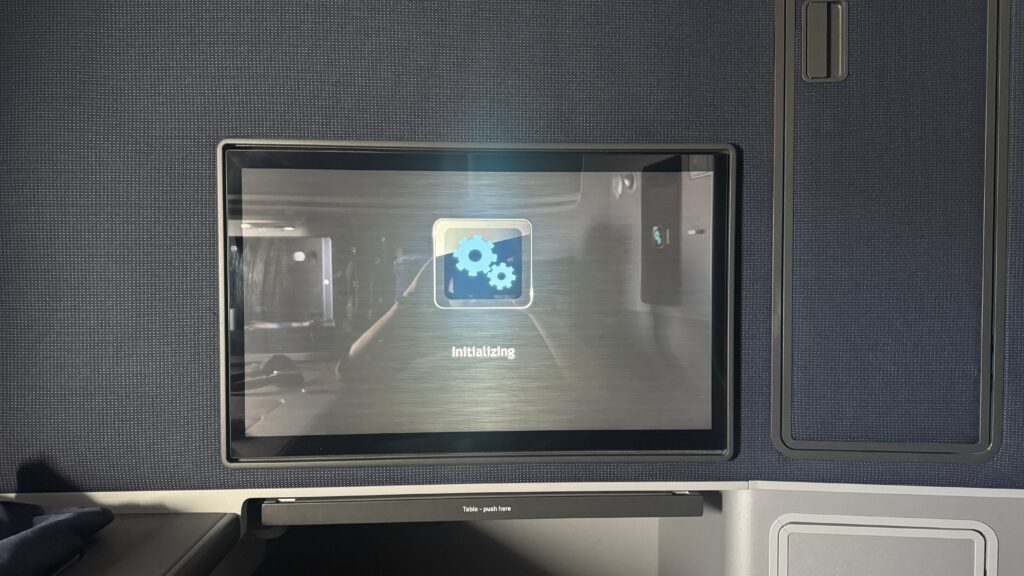 a screen with a blue and white logo on it
