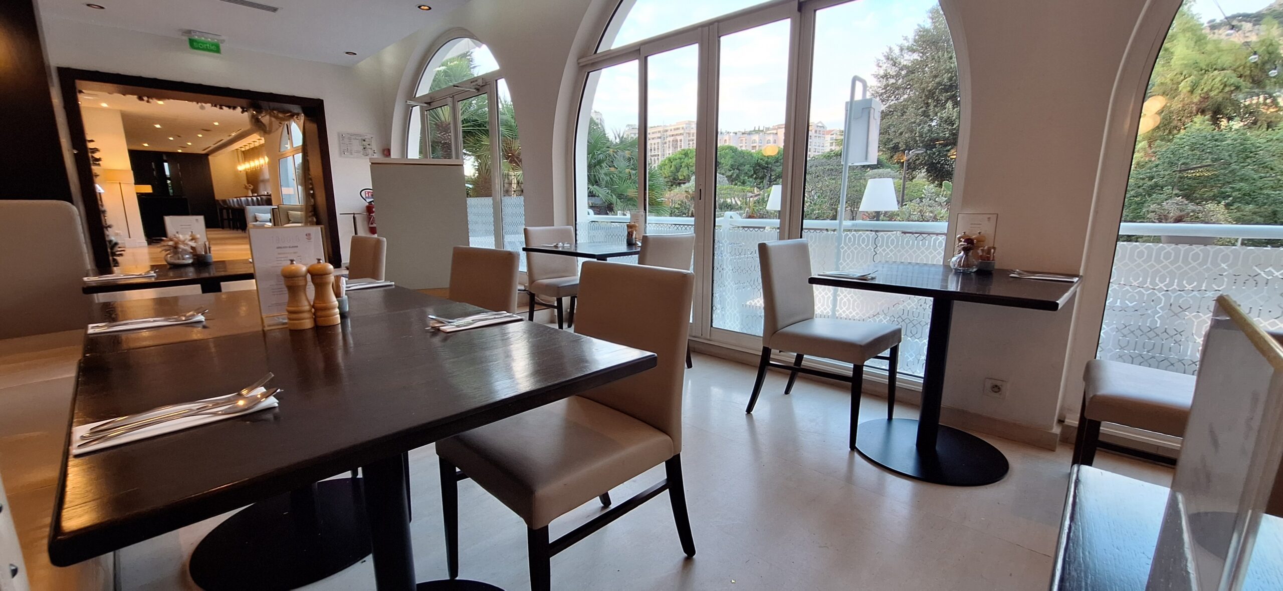 a room with tables and chairs