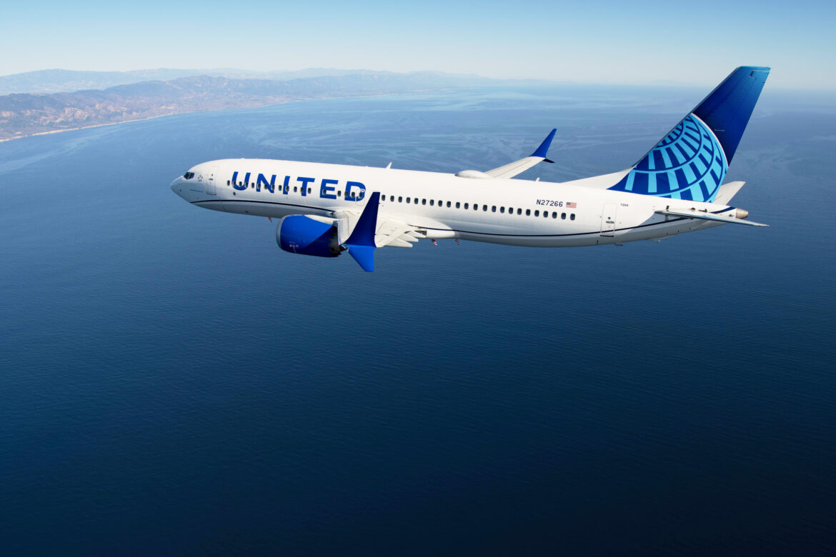 a plane flying over water