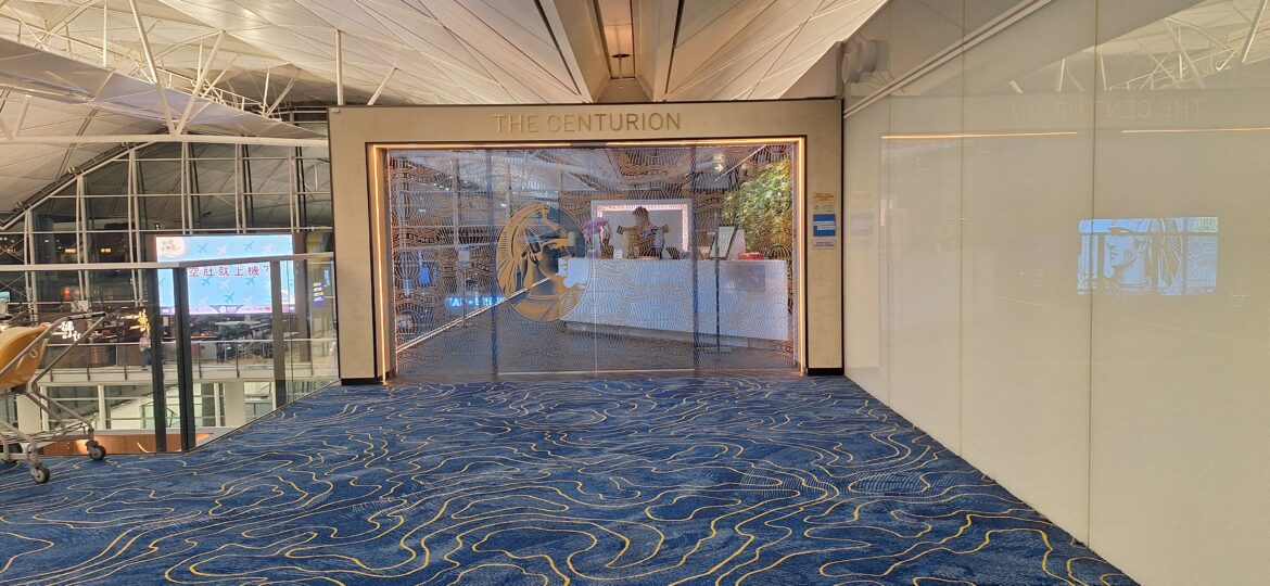 a glass door with a pattern on the wall