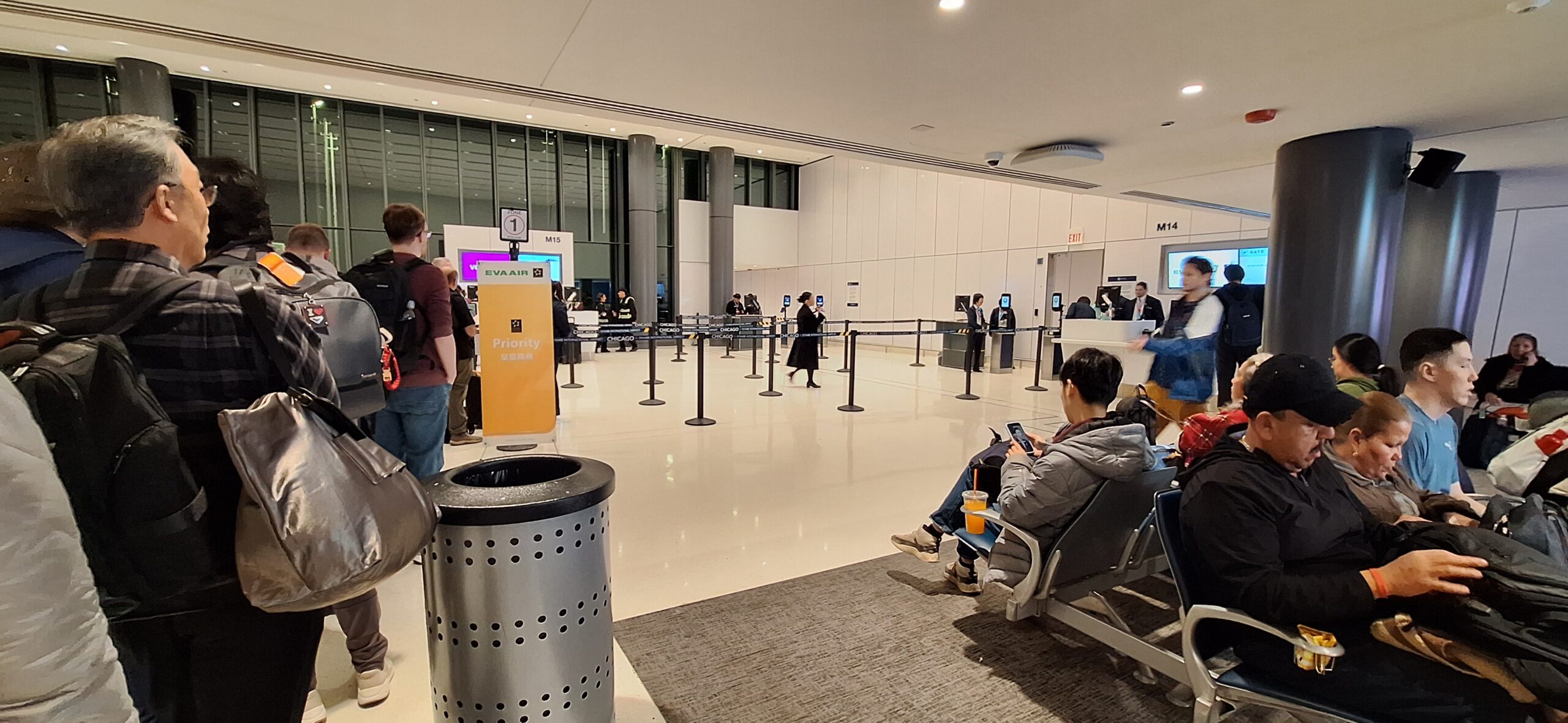 EVA Air Business Class people in an airport