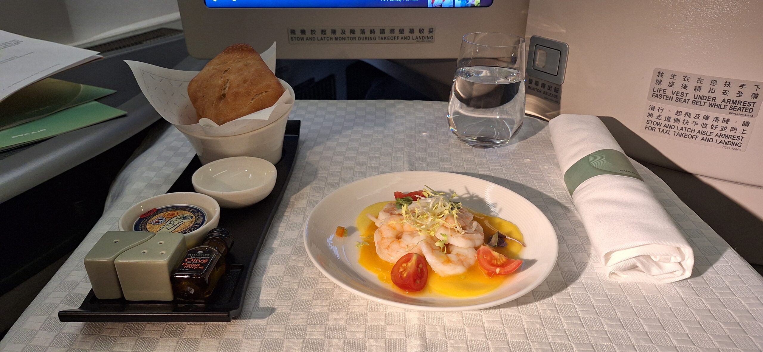EVA Air Business Class a plate of food on a table