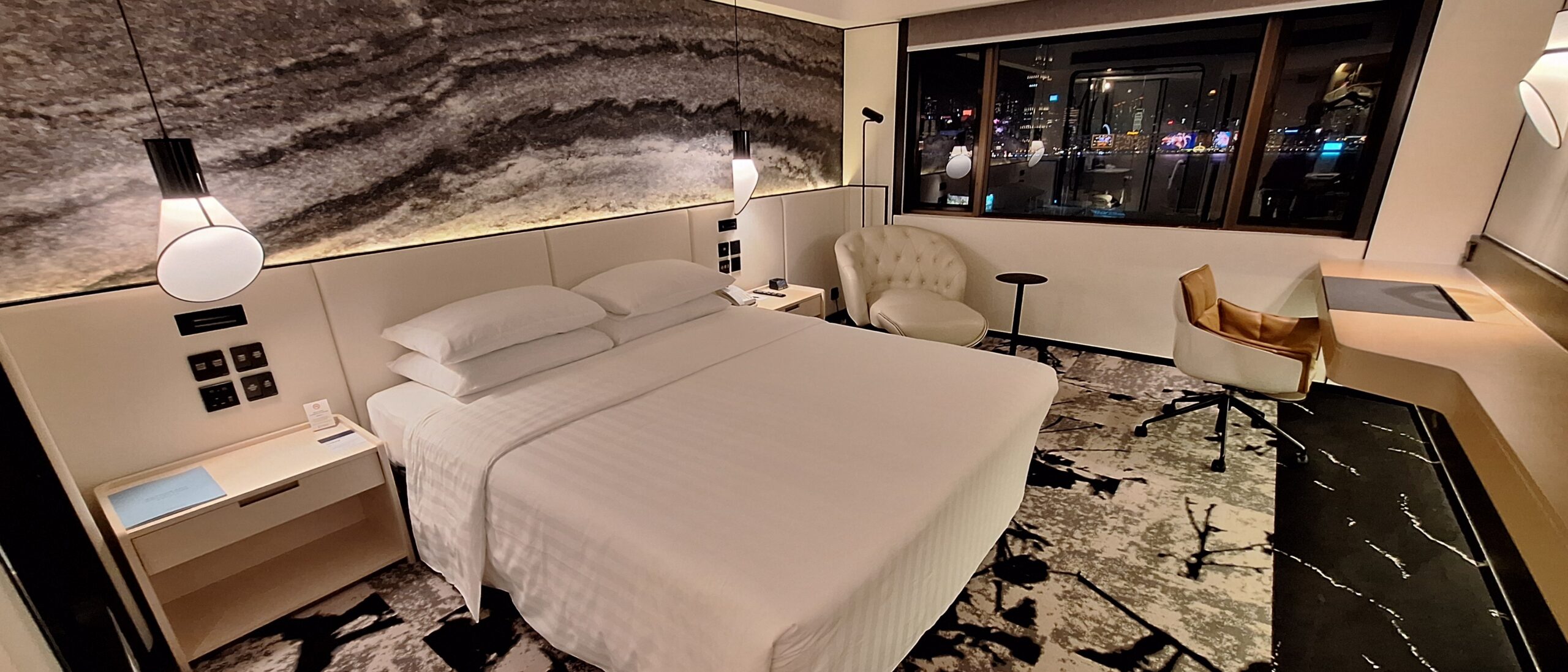 The Park Lane Hong Kong Review a bed in a room