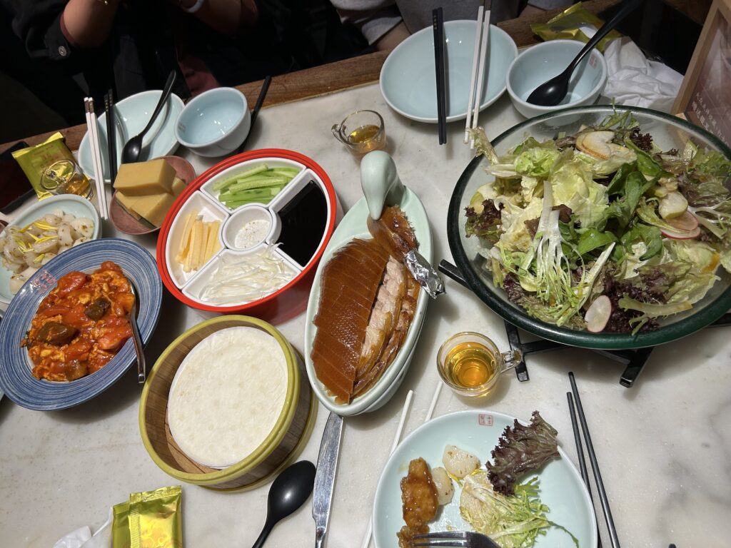 a table with different dishes and food on it