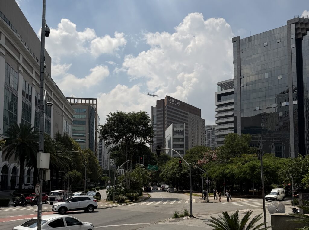 a city street with trees and buildings