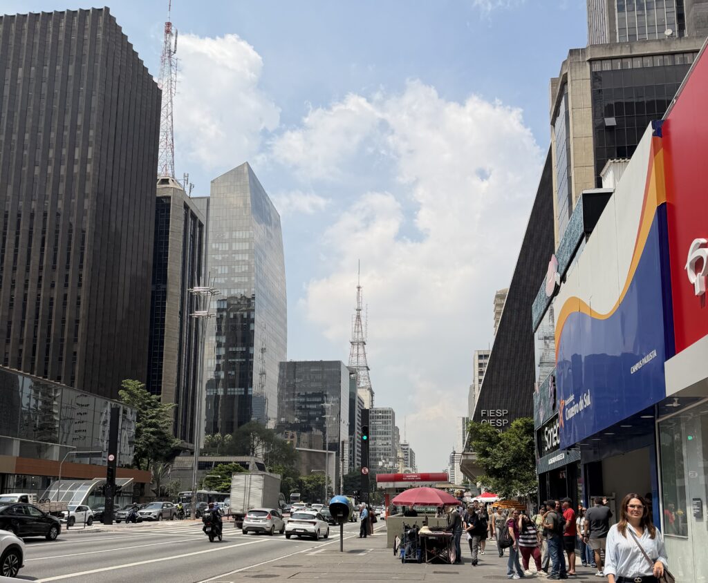 a city street with people walking on it