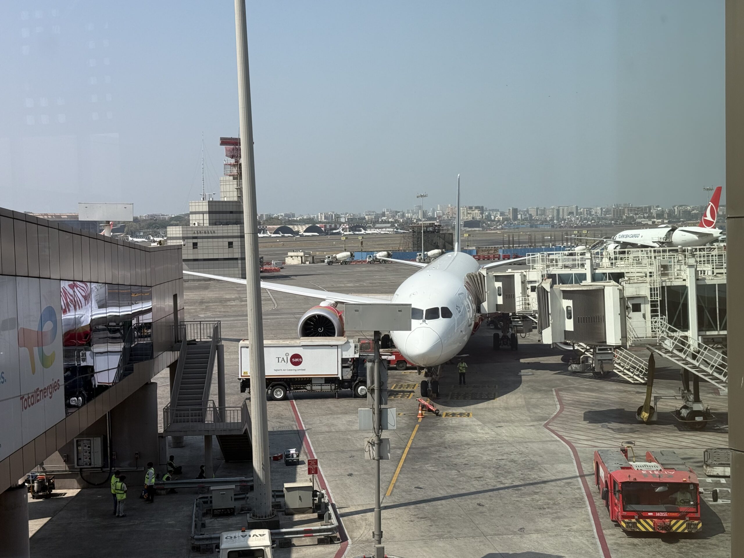 Air India 787-9 Business Class an airplane at an airport