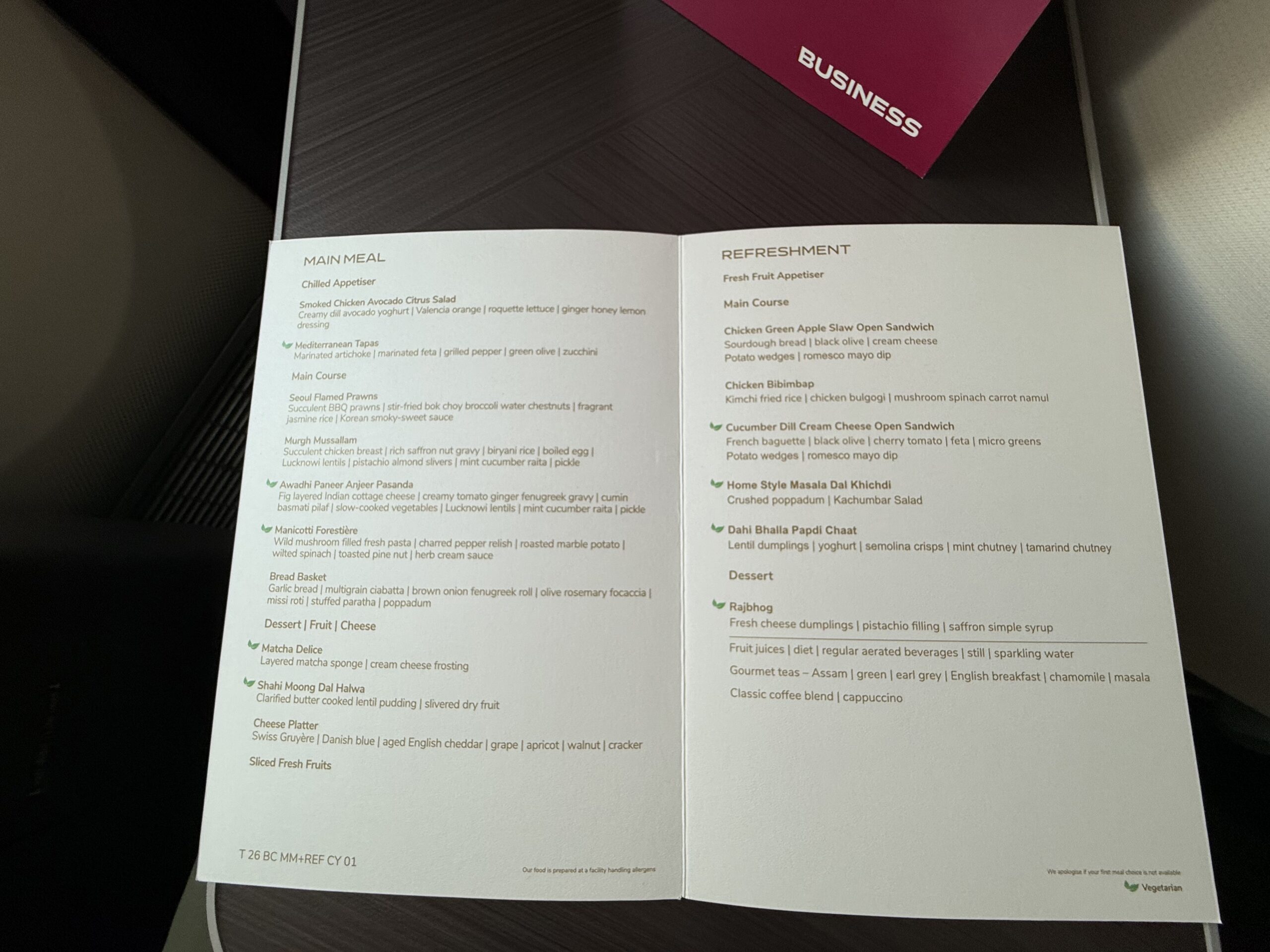 Air India 787-9 Business Class a menu on a table