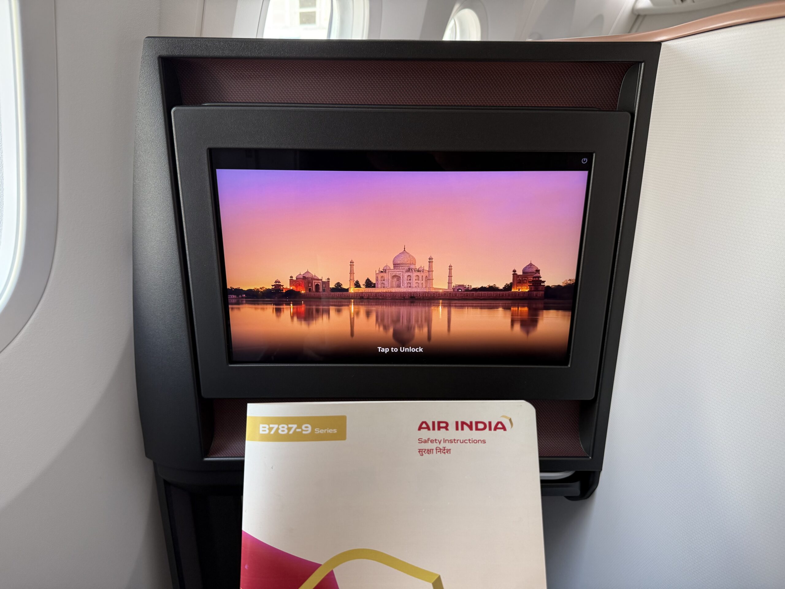 Air India 787-9 Business Class a screen on a plane