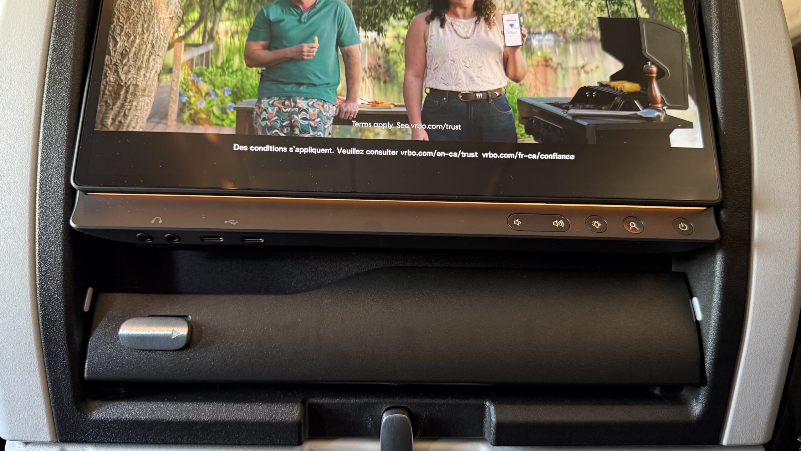 Inaugural Air Canada A321XLR a tv showing a couple of people