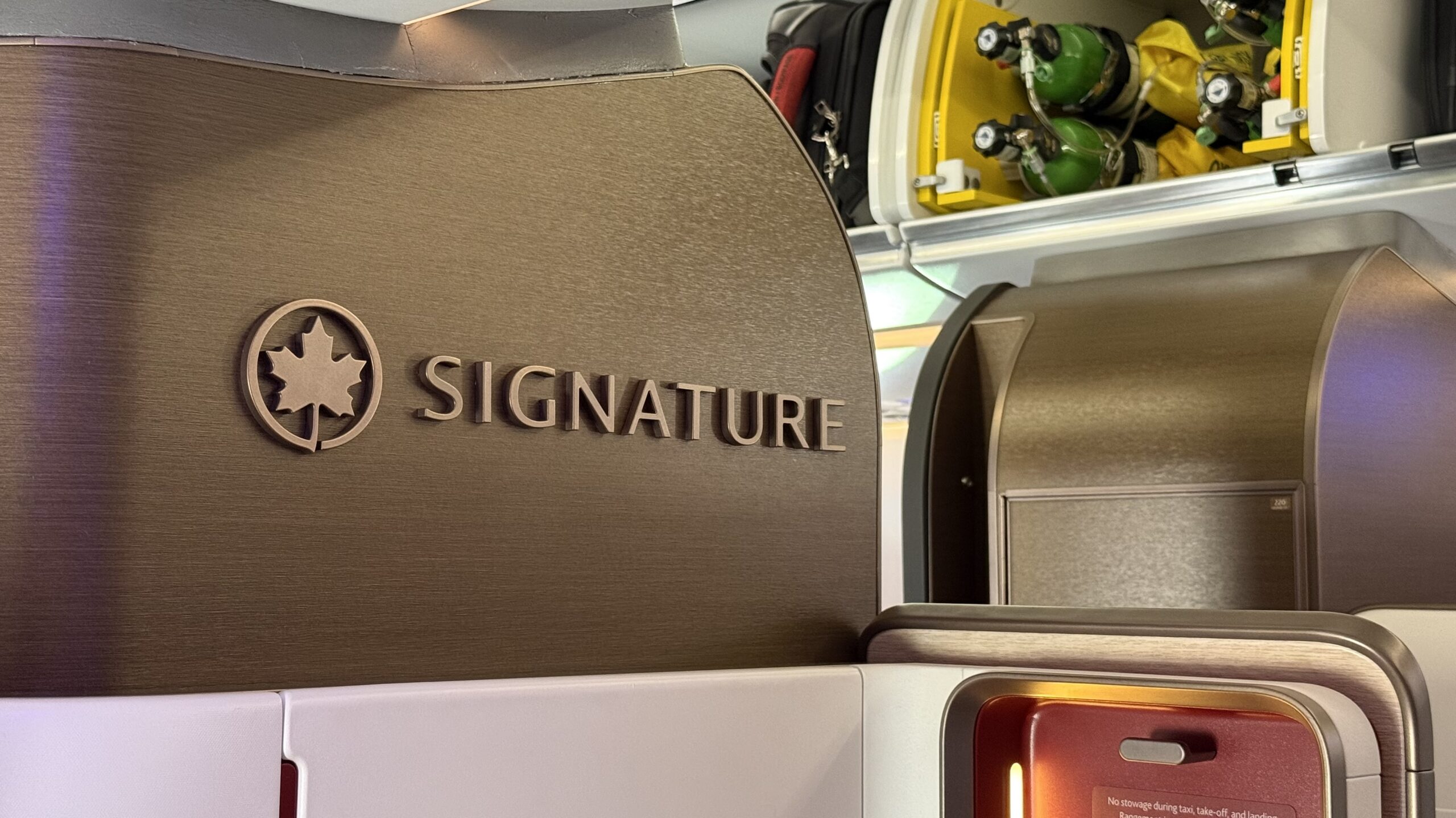 Inaugural Air Canada A321XLR a sign on a shelf
