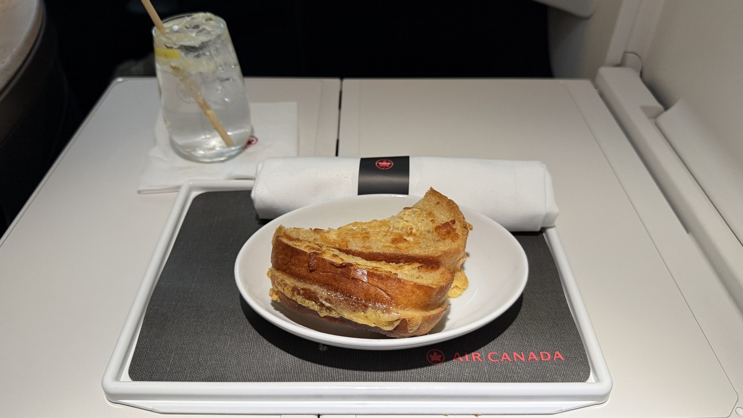 Inaugural Air Canada A321XLR a plate of food on a tray