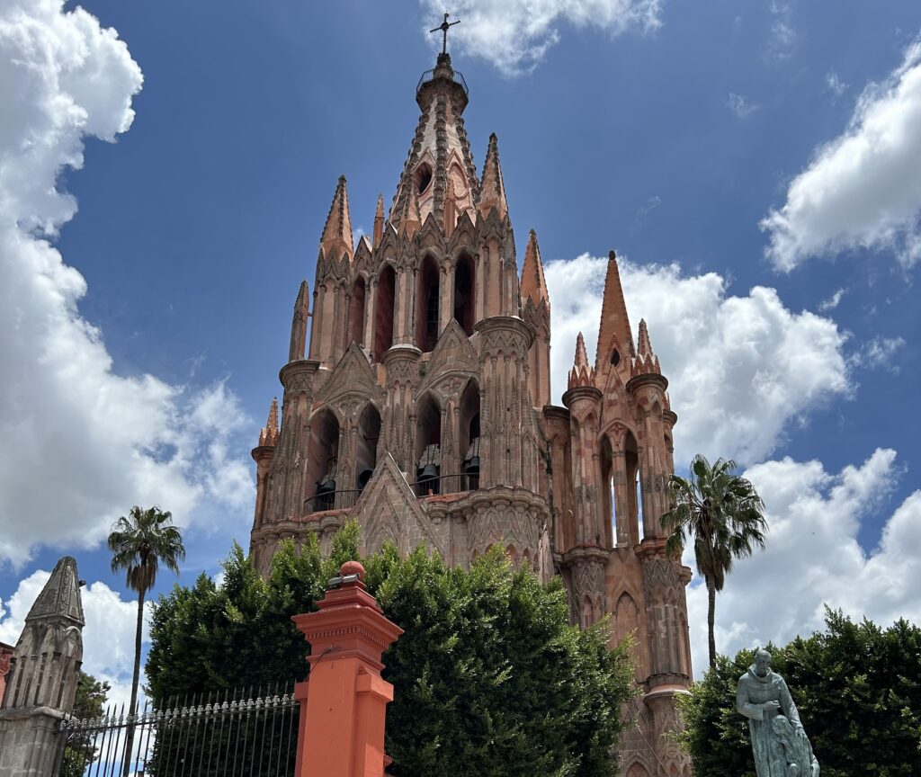 a large building with a cross on top