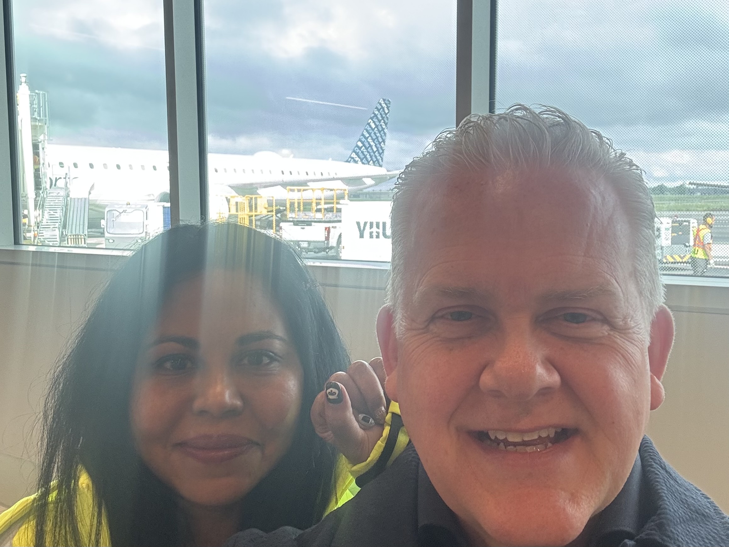 a man and woman taking a selfie