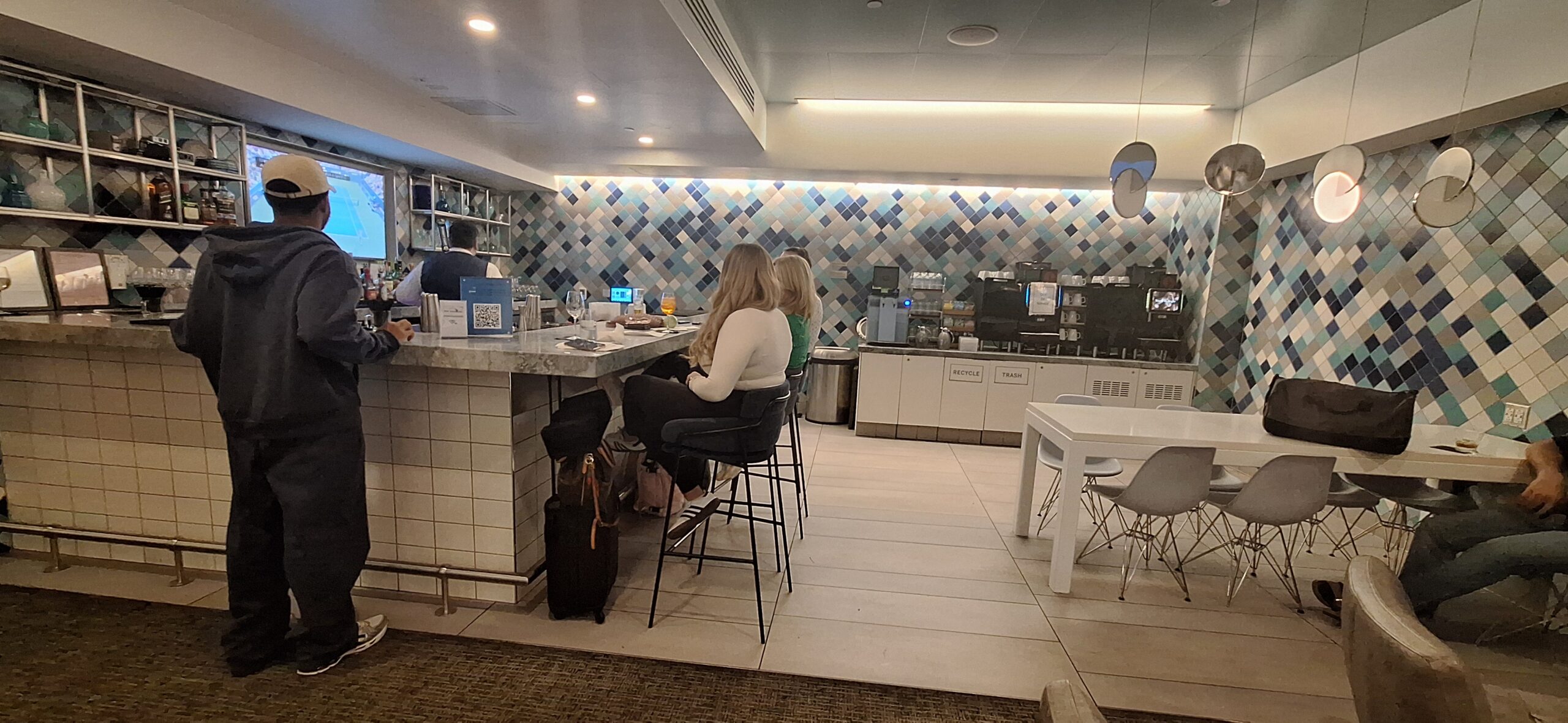 people sitting at a bar