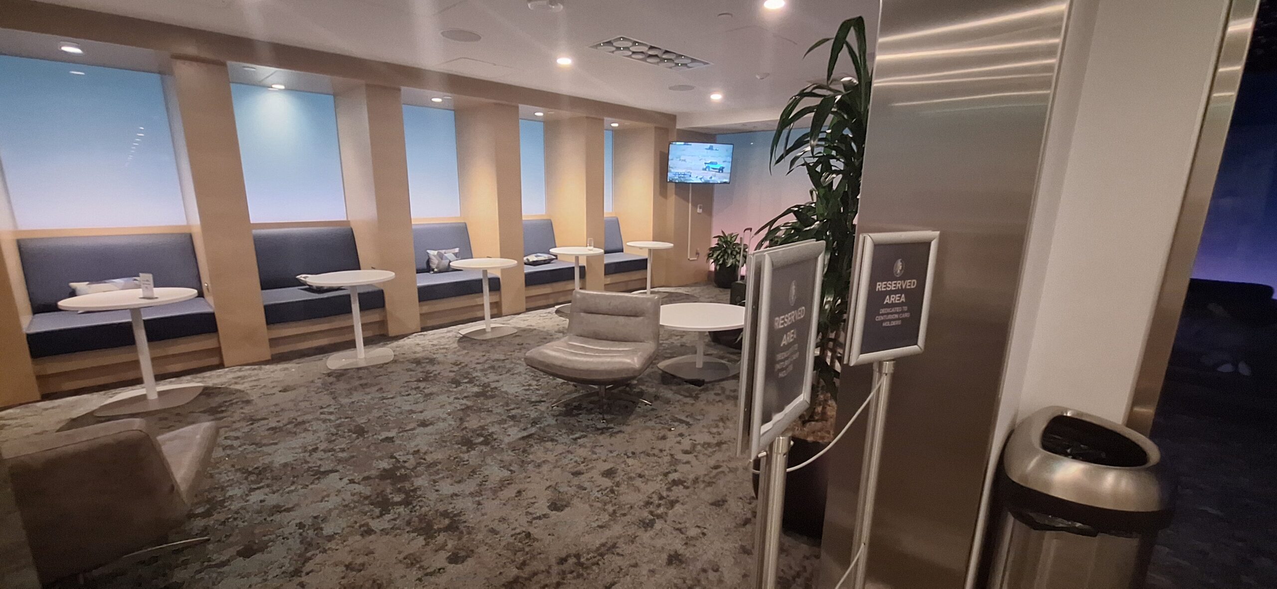 a room with chairs and tables