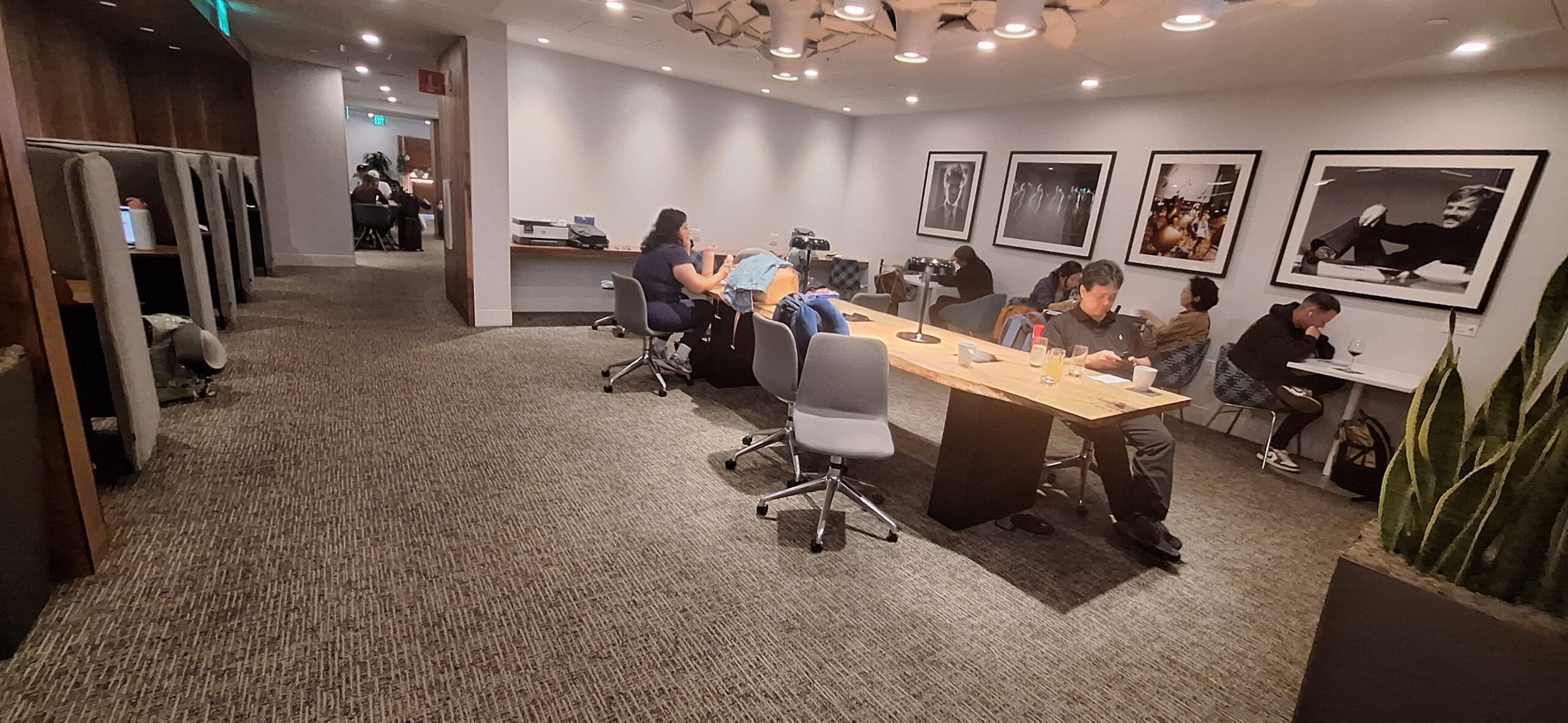 a group of people sitting in chairs in a room