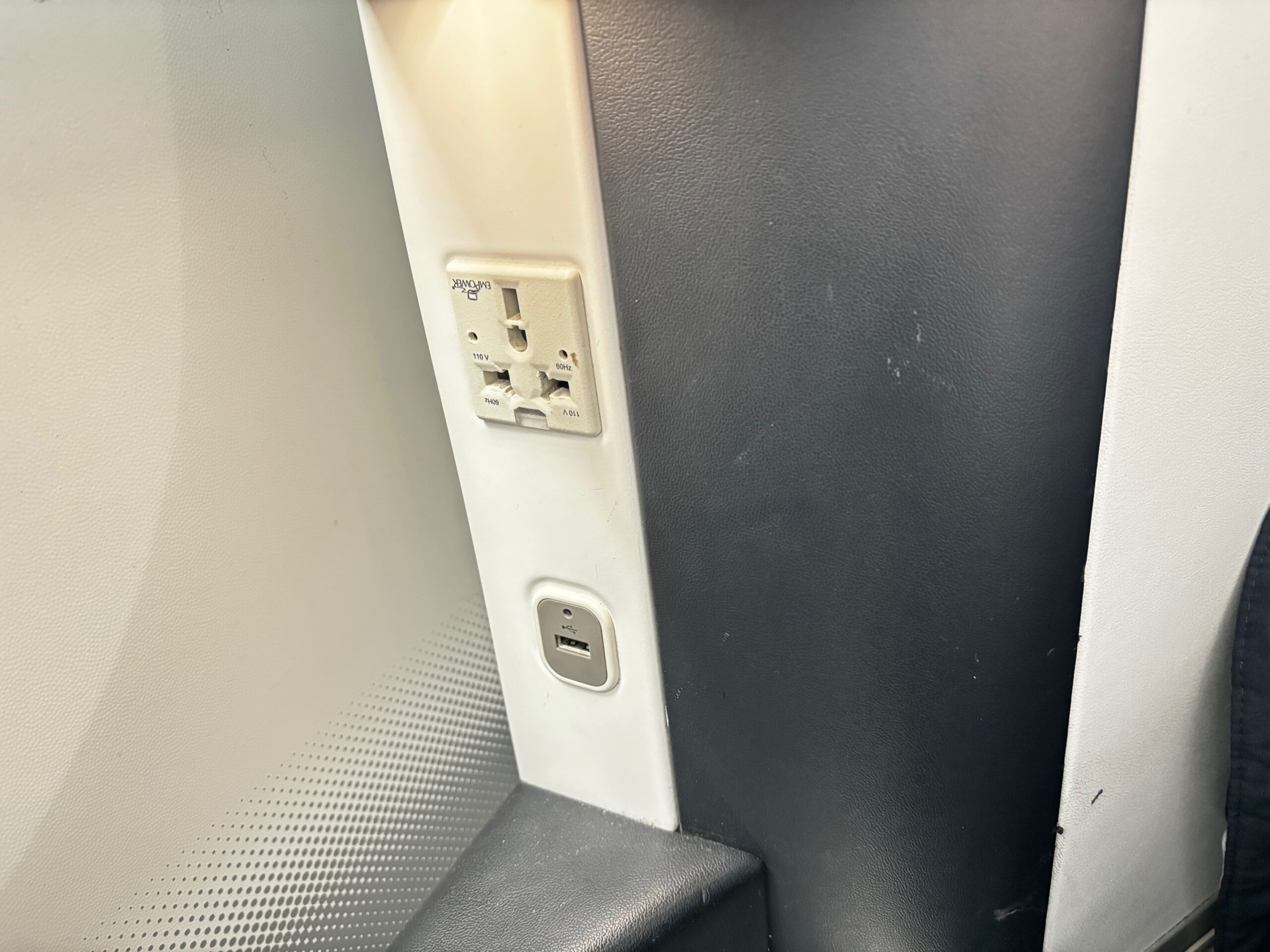 Power outlet and USB port